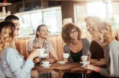 grouf of people drinking coffee